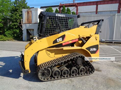 cat skid steer auxiliary hydraulics slow|cat skid steer power distribution.